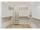 Large walk-in closet with ample shelving and hanging space at 22318 N 36Th St, Phoenix, AZ 85050