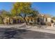Spanish style home with two-car garage and desert landscaping at 22318 N 36Th St, Phoenix, AZ 85050