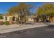 House exterior with driveway, landscaping, and two-car garage at 22318 N 36Th St, Phoenix, AZ 85050