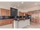 Island kitchen with granite countertops and ample cabinet space at 22318 N 36Th St, Phoenix, AZ 85050
