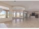Spacious living room with tile floors and large windows offering natural light at 22318 N 36Th St, Phoenix, AZ 85050