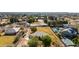 Aerial view of house, pool, and tennis court at 22610 S 174Th St, Gilbert, AZ 85298