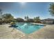 Sparkling community pool with plenty of space for relaxation at 2367 W Jake Hvn, Phoenix, AZ 85085