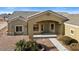 Front view of a house with a covered entryway and walkway at 24508 S 194Th St, Queen Creek, AZ 85142