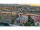 Aerial view of house, yard, and surrounding community at 26735 W Quail Ave, Buckeye, AZ 85396