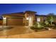 Single story home with landscaped yard at 26735 W Quail Ave, Buckeye, AZ 85396