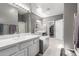 Elegant bathroom with double vanity and marble countertops at 2714 N 63Rd St, Mesa, AZ 85215