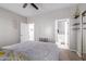 Bedroom with a queen bed, en-suite bathroom access, and neutral decor at 2714 N 63Rd St, Mesa, AZ 85215
