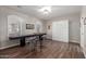 Game room with shuffleboard table and built-in murphy bed at 2714 N 63Rd St, Mesa, AZ 85215