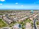 Wide aerial shot of a planned community showcasing the many homes and green spaces within the neighborhood at 2776 E Mews Rd, Gilbert, AZ 85298