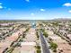 High aerial shot highlighting a community with well-placed homes, roadways, and mountain views at 2776 E Mews Rd, Gilbert, AZ 85298