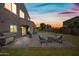 Spacious backyard featuring a brick patio, stainless steel grill, and ample space for outdoor activities at 2776 E Mews Rd, Gilbert, AZ 85298