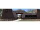 Stone community entrance with a welcoming sign and landscaped grounds at 2776 E Mews Rd, Gilbert, AZ 85298