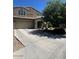Charming two-story home with a two car garage, inviting curb appeal and lush landscaping at 2776 E Mews Rd, Gilbert, AZ 85298