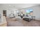 Inviting living room filled with natural light, comfortable seating, and stylish décor perfect for relaxation and entertainment at 2776 E Mews Rd, Gilbert, AZ 85298