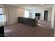 Spacious living room with plush sofa and large TV at 2776 E Mews Rd, Gilbert, AZ 85298