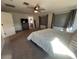 Large main bedroom with plush carpet and ceiling fan at 2776 E Mews Rd, Gilbert, AZ 85298