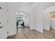 Bright, open office space with natural light, neutral walls, and wood-look tile flooring perfect for a home office at 2776 E Mews Rd, Gilbert, AZ 85298