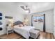 Bright bedroom with wood flooring, large window and modern ceiling fan at 2850 E Cortez St, Phoenix, AZ 85028