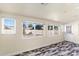 Bonus room with multi-pane windows and unique wood look flooring at 2850 E Cortez St, Phoenix, AZ 85028