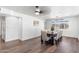 Bright dining room features modern table, chairs, and updated lighting with wood flooring at 2850 E Cortez St, Phoenix, AZ 85028