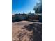 Large backyard with storage shed and gravel ground at 2853 W Ohio St, Apache Junction, AZ 85120