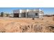 New construction home exterior, showcasing a contemporary design at 28551 N 257Th Ave, Wittmann, AZ 85361