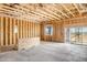 Interior framing of a large room with sliding glass doors at 28551 N 257Th Ave, Wittmann, AZ 85361