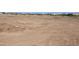 Expansive piece of land, showcasing potential for development and scenic views at 28551 N 257Th Ave, Wittmann, AZ 85361