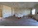 Spacious living room featuring light wood floors and neutral walls ready for personalization at 28551 N 257Th Ave, Wittmann, AZ 85361