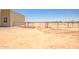 Large lot with fencing, offering ample space for outdoor activities and customization at 28615 N 257Th Dr, Wittmann, AZ 85361