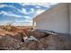 Exterior view of new house septic system under construction at 28615 N 257Th Dr, Wittmann, AZ 85361