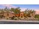 House exterior view, showcasing stone and desert landscaping at 3461 N Ladera Cir, Mesa, AZ 85207