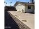Large backyard with a concrete patio and gated entry at 3506 W Yucca St, Phoenix, AZ 85029