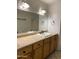 Bathroom boasts double sinks and a large vanity mirror at 3506 W Yucca St, Phoenix, AZ 85029