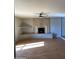 Living room fireplace with a tiled hearth and mantle at 3506 W Yucca St, Phoenix, AZ 85029