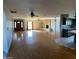 Large living room, hardwood floors, fireplace and kitchen access at 3506 W Yucca St, Phoenix, AZ 85029