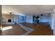 Open living area with hardwood floors and a fireplace at 3506 W Yucca St, Phoenix, AZ 85029