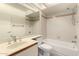 Bathroom with a tub, shower, and updated vanity at 3535 W Monte Cristo Ave # 101, Phoenix, AZ 85053
