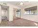 Bedroom with mirrored closet doors and ceiling fan at 3535 W Monte Cristo Ave # 101, Phoenix, AZ 85053