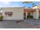 Tan stucco condo with red tile roof, walkway, and small front yard at 3535 W Monte Cristo Ave # 101, Phoenix, AZ 85053