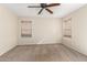 Bright bedroom featuring neutral walls and carpet at 3777 W White Canyon Rd, San Tan Valley, AZ 85144