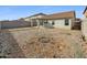 Large backyard with gravel and a covered patio at 40551 N Jodi Dr, San Tan Valley, AZ 85140