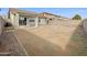 Spacious backyard with gravel landscaping and covered patio at 40551 N Jodi Dr, San Tan Valley, AZ 85140