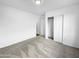 Simple bedroom with carpeted floor and a large closet at 40551 N Jodi Dr, San Tan Valley, AZ 85140