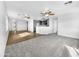 Open living space featuring hardwood and carpeted floors at 40551 N Jodi Dr, San Tan Valley, AZ 85140