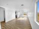 Open living room featuring tile flooring and access to backyard at 40551 N Jodi Dr, San Tan Valley, AZ 85140