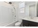 Clean and bright bathroom with a shower-tub combination and modern vanity at 4342 E Enmark Dr, San Tan Valley, AZ 85143