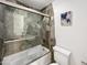 Bathroom with stone shower and updated fixtures at 4950 N Miller Rd # 130, Scottsdale, AZ 85251
