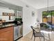 Charming breakfast nook with wine fridge and access to private patio at 4950 N Miller Rd # 130, Scottsdale, AZ 85251